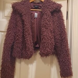Nwot Torrid faux fur crop jacket.